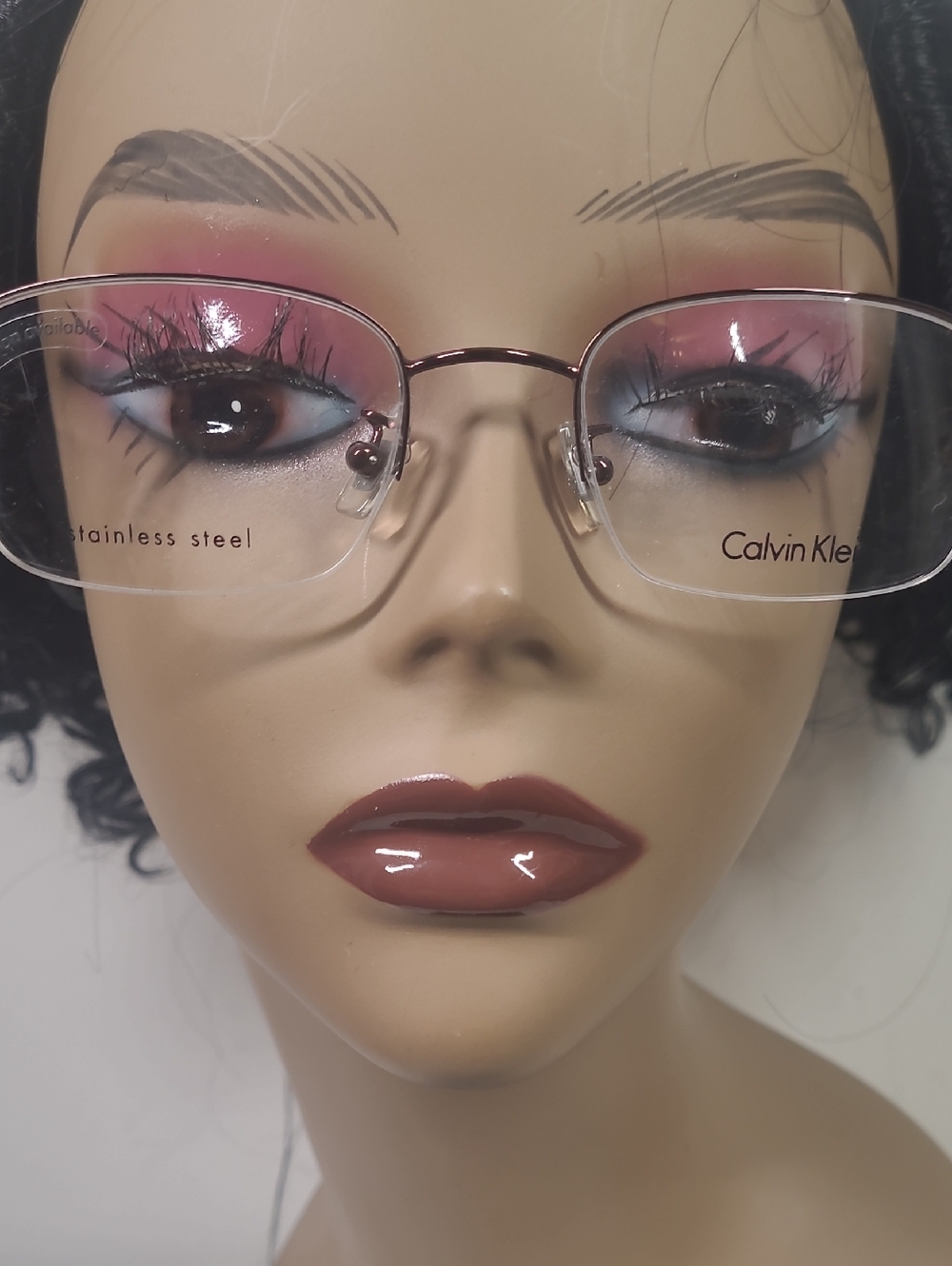 Calvin Klein Women's Rimless Glasses with Clear Gradient Lenses